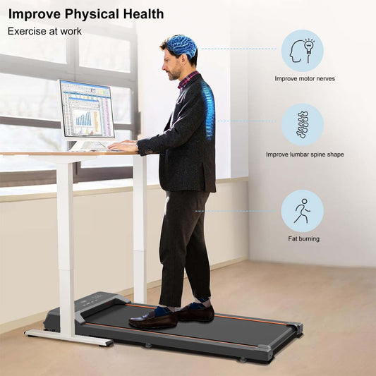 Under desk treadmill in use under office desk