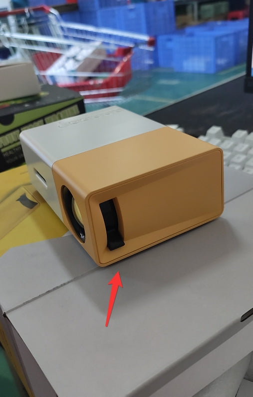 Portable LED projector showing HDMI and USB ports