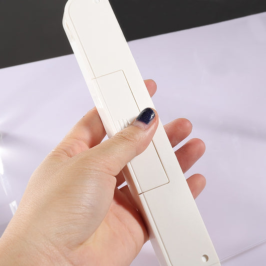 Dimmable LED reading lamp illuminating an open book for comfortable night reading