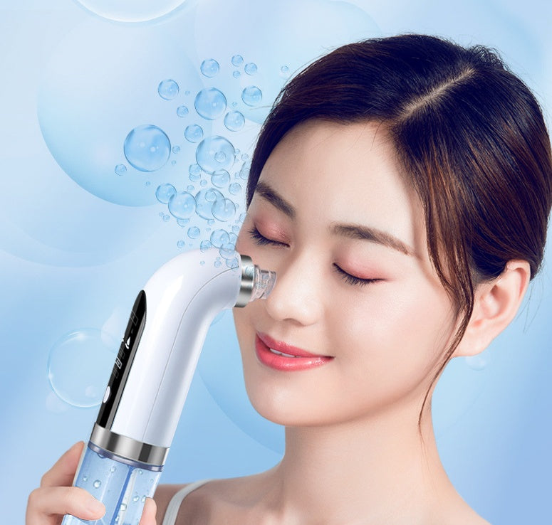 Blackhead Vacuum being used on a woman's face with water bubbles in the background for effective pore cleaning.