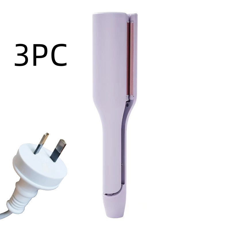 hair curling iron creating deep wave hairstyle