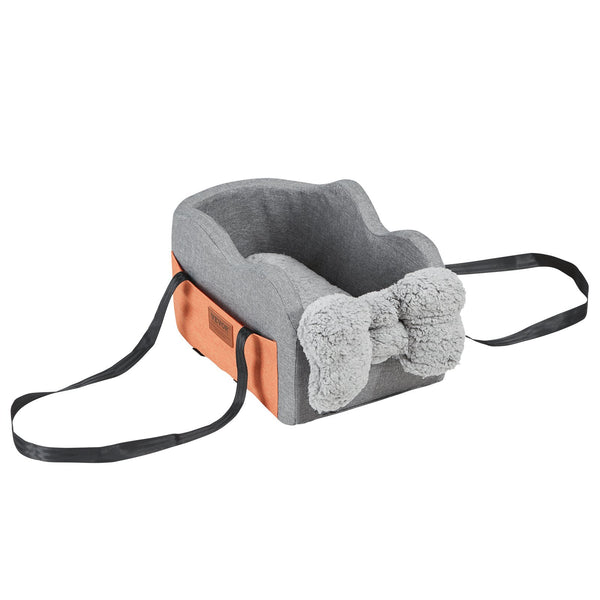 dog car seat booster installed on car console with small dog inside