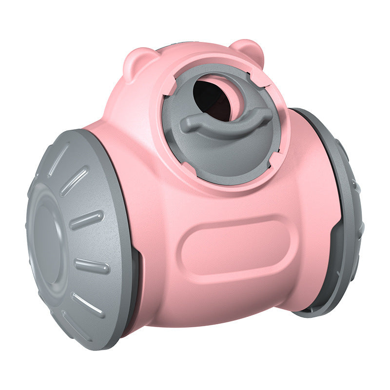 Dog Tumbler Toy in pink and gray, designed for interactive slow feeding and puzzle play for pets.