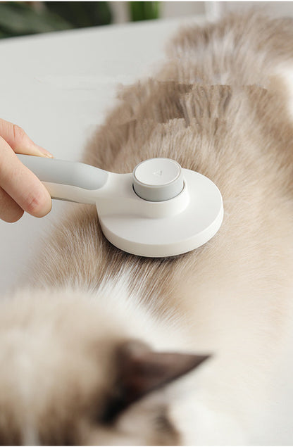 pet grooming brush in use on dog removing loose fur