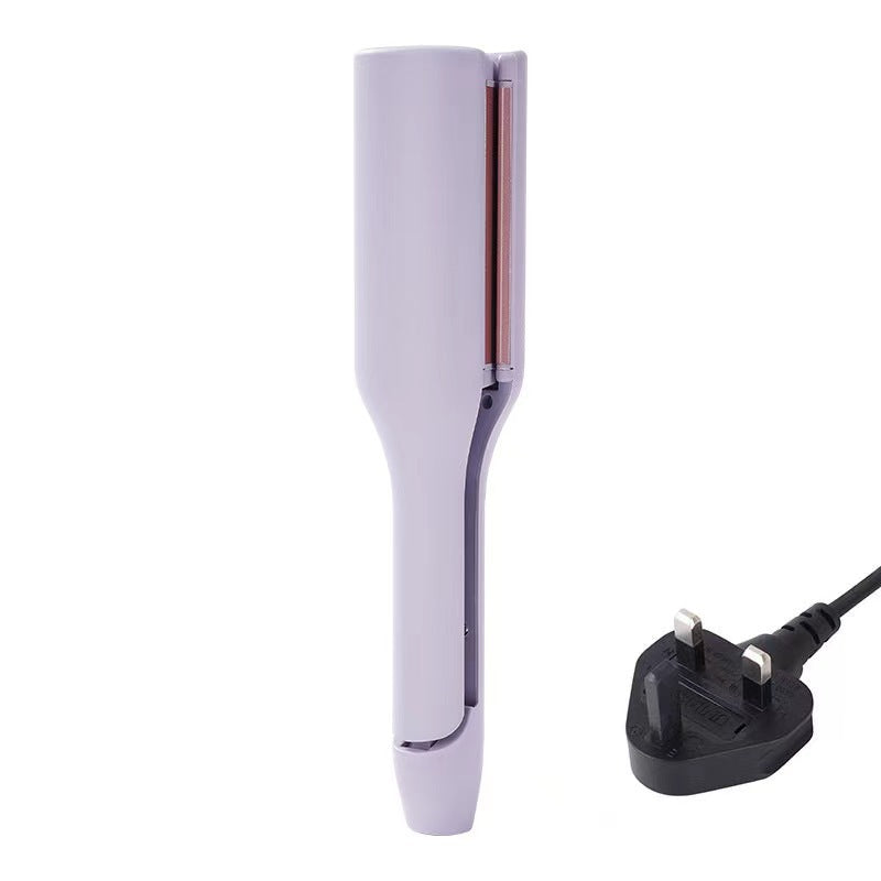hair curling iron creating deep wave hairstyle