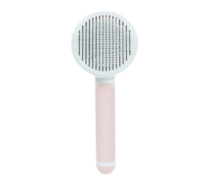 pet grooming brush in use on dog removing loose fur