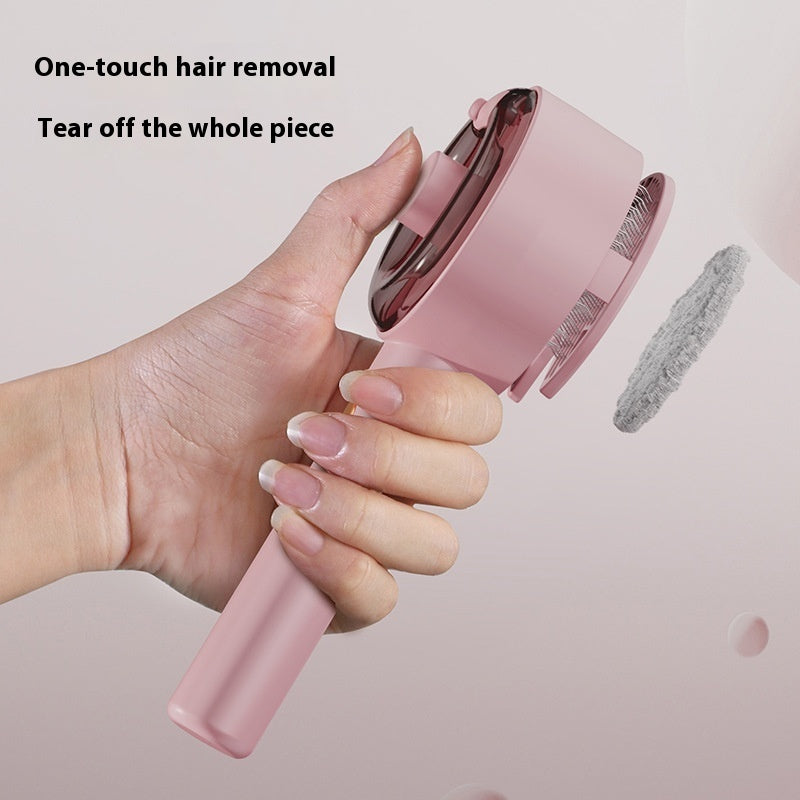 Pet hair remover brush used on dog coat during grooming