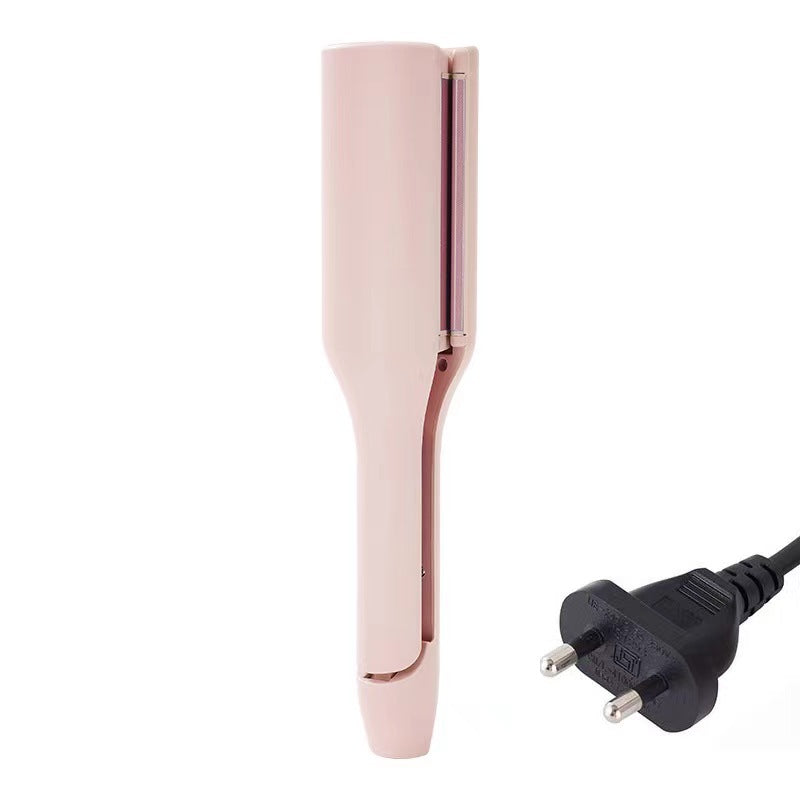 hair curling iron creating deep wave hairstyle
