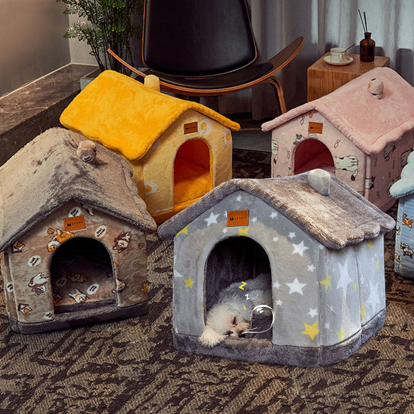 A foldable dog house in use with pet resting inside