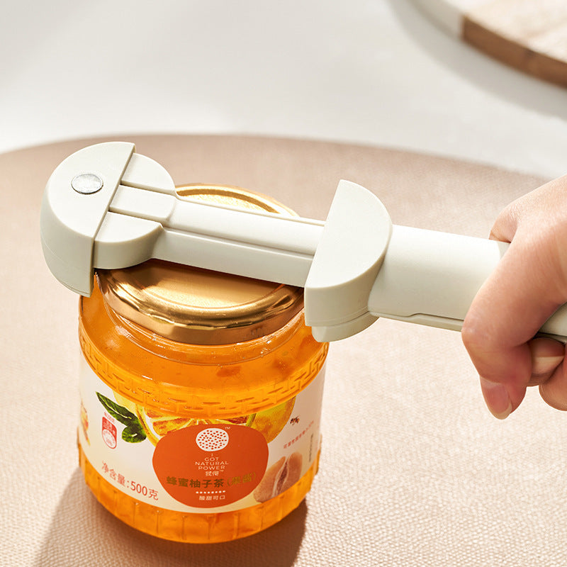 Stainless steel can opener opening metal can
