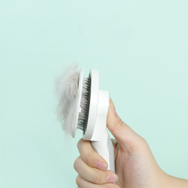 pet grooming brush in use on dog removing loose fur