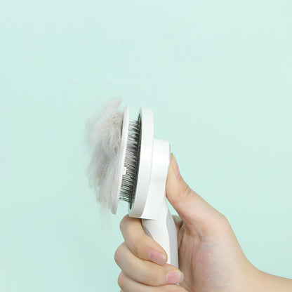 pet grooming brush in use on dog removing loose fur