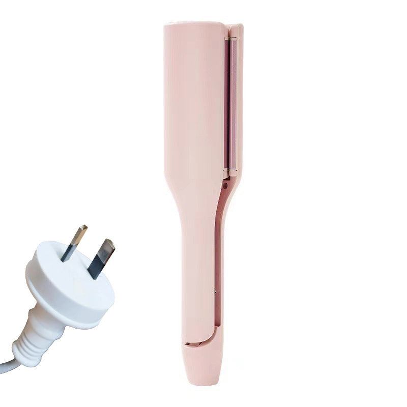 hair curling iron creating deep wave hairstyle