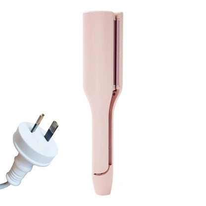 hair curling iron creating deep wave hairstyle