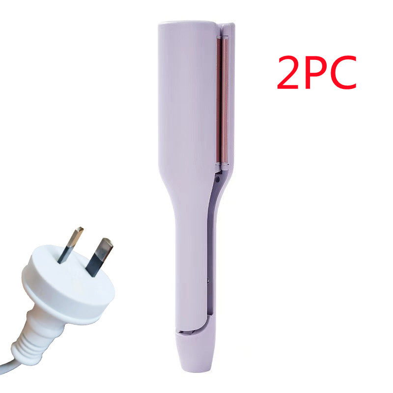 hair curling iron creating deep wave hairstyle
