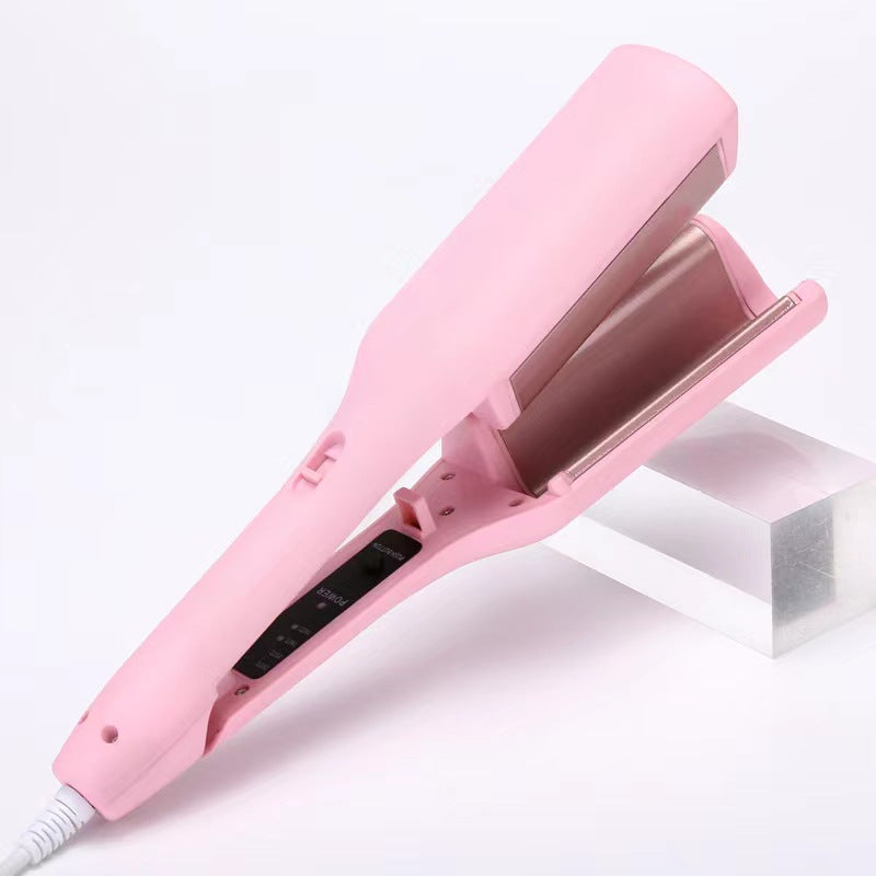 hair curling iron creating deep wave hairstyle