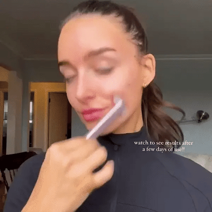 red light therapy wand in use on facial skin