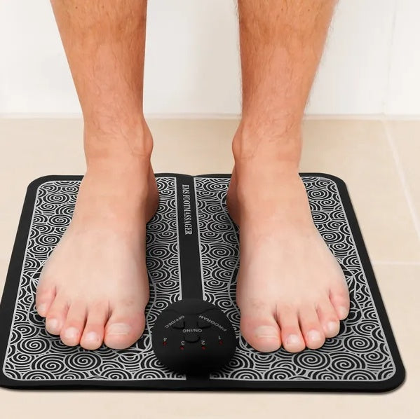 EMS foot massager in use at home
