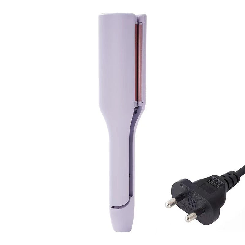 hair curling iron creating deep wave hairstyle