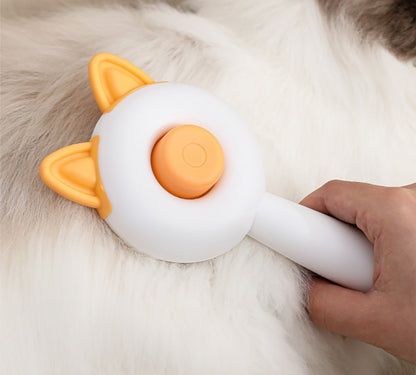 Pet Hair Brush designed for easy grooming, featuring a self-cleaning mechanism and a comfortable grip for pets.