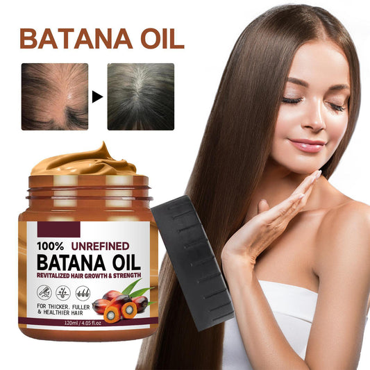 1: Batana hair oil applied to hair during routine