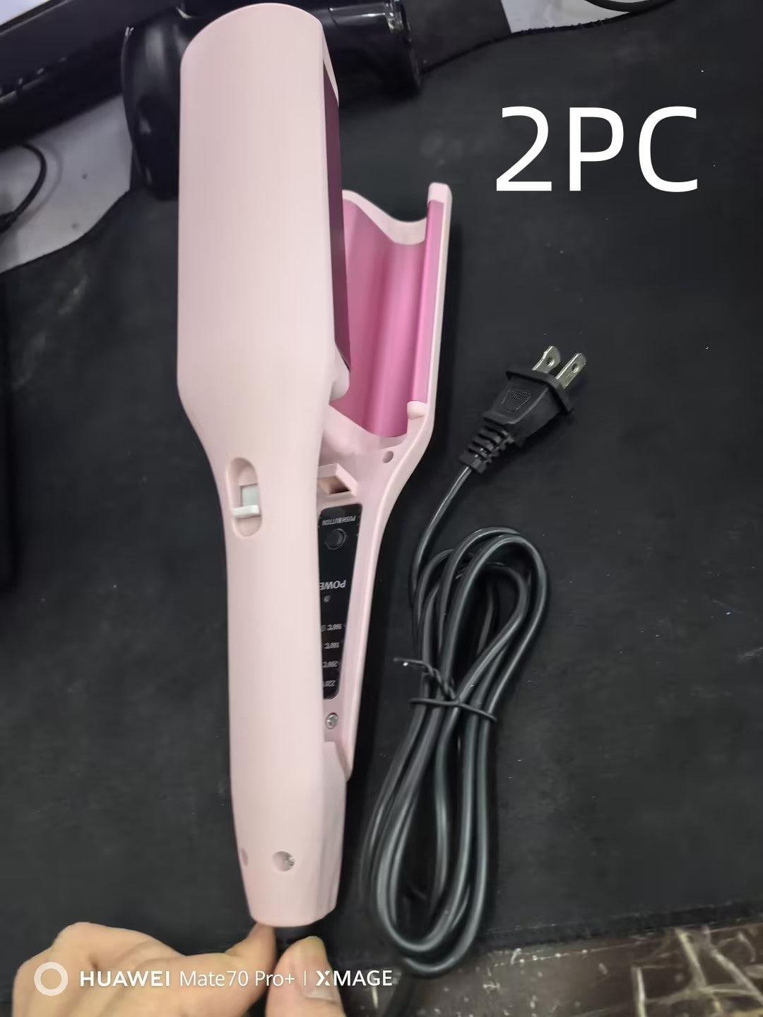 hair curling iron creating deep wave hairstyle